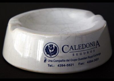 Cenicero de Caledonia Argentina Compañía de Seguros S. A.