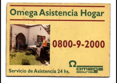 Omega Asistencia Hogar. Imán para heladera. Omega Seguros Sociedad Anónima.