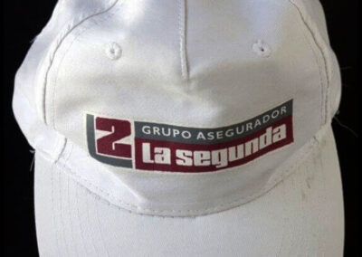 Gorra de La Segunda Cooperativa Limitada de Seguros Generales.